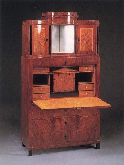 19th Century AUSTRIAN, Biedermeier Mahogany, Fruitwood and Burl Walnut Fall-Front Secrétaire, 1820-1825
Mixed woods, 76 3/8 x 42 1/8 x 18 3/4 in. (194 x 107 x 47.6 cm)
The superstructure is fitted with a mirrored niche and flanked by two incurved cupboard doors surmounted by a stepped cornice above one frieze drawer and the fall-front opening to a fitted architectural interior centered by
BIE-001-FU